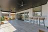 Screened patio with pass through bar