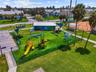 Near Rosselli Park with new Pickleball, dog park, shuffleboard, playground, pavilion, walking trail