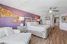 This primary bedroom is so large you can fit all your furniture