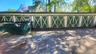 Property Includes (8) Garages