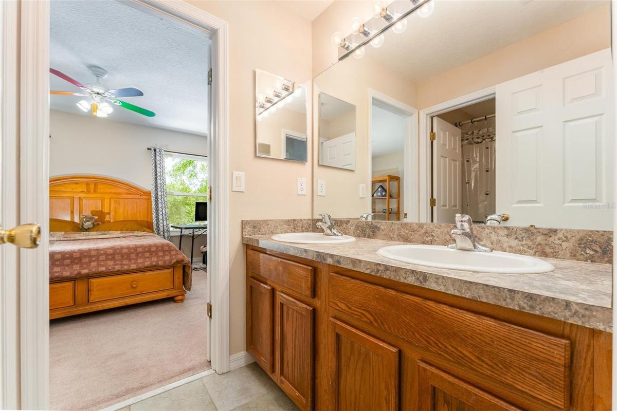 full bath that is attached to bedroom 2 & serves the rest of the upstairs