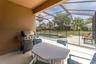 cover rear porch within screened lanai