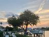 Enjoy Waterfront, living with tranquil views and colorful sunsets glowing just to the left each evening.