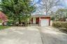 Corner lot location with extended driveway