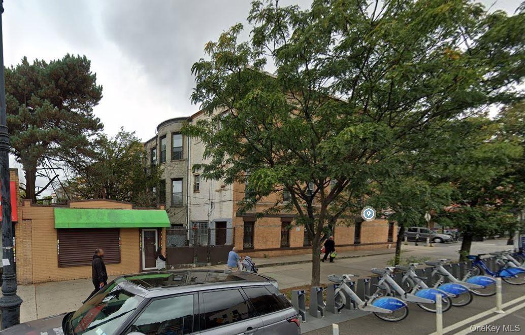 Side view that includes the 1 story commercial building