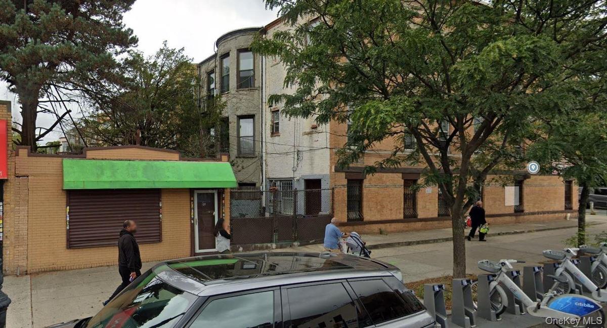 Side view that includes the 1 story commercial building