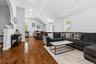 Accessory Unit -Open-concept living area with wood-finish flooring, vaulted ceilings, and recessed lighting