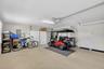 Garage with Included 4-Seater Yamaha Quiet Tech Drive 2 Golf Cart