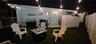 side yard with full outdoor shower and fire pit