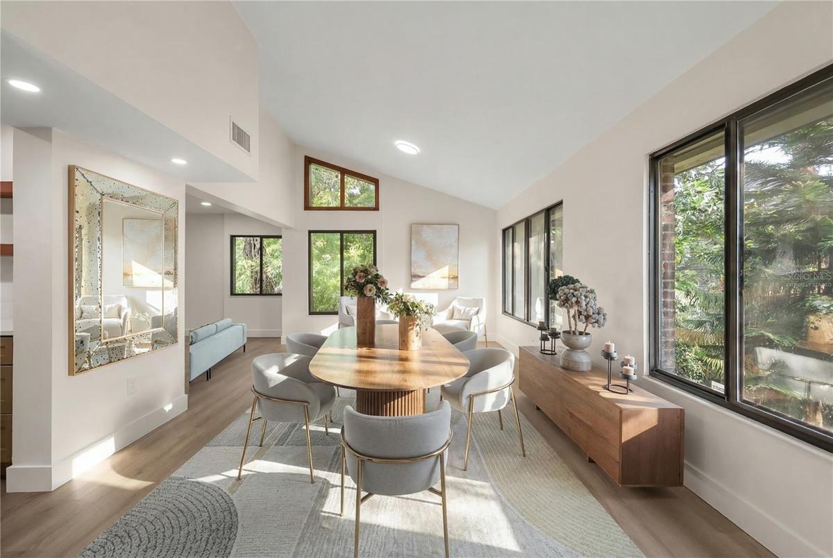 virtually staged dining room and sitting area