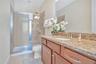 Ensuite to the 'Rivera Maya' Suite - with granite vanity and modern finishes serving this themed suite