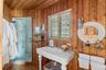 Full Bathroom to the left within Downstairs Hallway