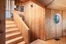 Stairs to upstairs leading to primary bedroom