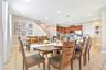 Large dining space designed to comfortably accommodate group meals and gatherings.