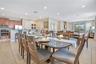 Bright, open dining area with direct access to the main living space.
