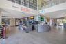 Encore Resort clubhouse interior with concierge services, dining, and guest amenities