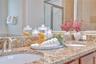 Granite counters and ample storage create both function and style.