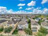 Aerial view showcasing the home’s private pool and prime positioning within Encore at Reunion