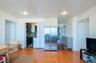 Kitchen with stainless steel fridge with ice dispenser, light wood-style floors, backsplash, range with gas stovetop, and white cabinets