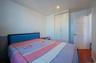 Bedroom featuring a closet, wood finished floors, and recessed lighting