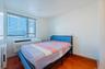 Bedroom featuring wood finished floors and radiator