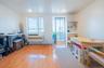 Rec room featuring radiator heating unit and light wood finished floors