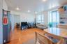 Living room featuring light wood-type flooring and recessed lighting