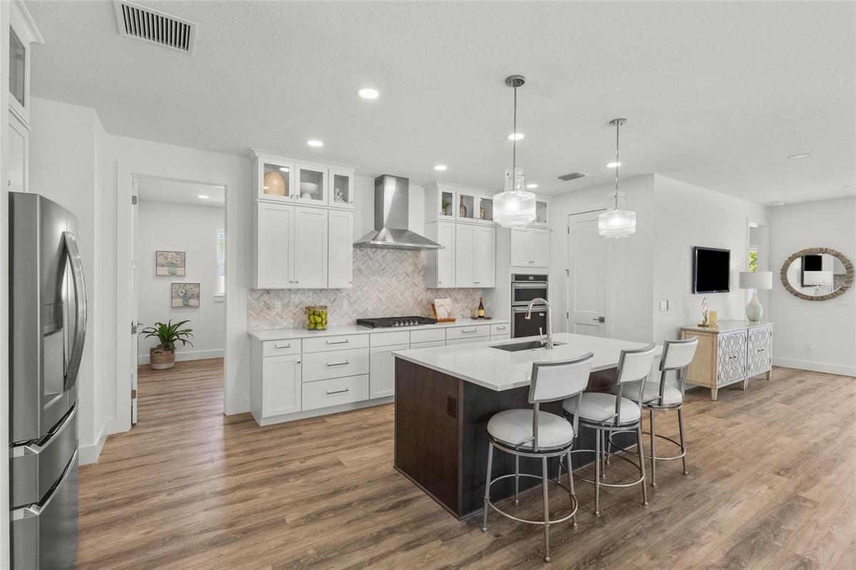 Quartz Countertops/Laundry room to the left