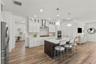 Quartz Countertops/Laundry room to the left