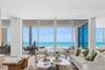 Open living space features a vapor fire place to designate additional club room