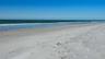 Enjoy nearly 100 feet of private beach on Longboat Key's widest section of newly enhanced beach