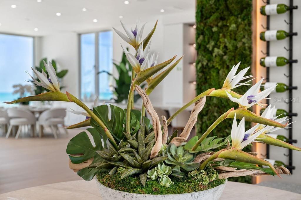Biophyllic green wall greets you off the elevator as you enter the second floor