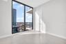 Guest Bedroom with floor-to-ceiling glass windows