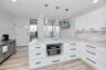 No outlets visable on backsplash, in counter pop-ups