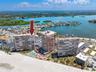Front to back waterviews. Bayview from the front door and beach views from the wrap-around balcony
