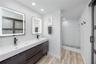 En-suite primary bath with large linen closet