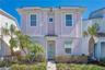 Coastal inspired Margaritaville cottage in Kissimmee Florida near Disney with vibrant exterior and prime resort location