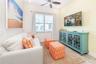 Bright living room with natural light and coastal finishes in Margaritaville Resort Orlando
