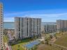 Landmark Tower One features a pool, spa, tennis & pickleball courts, a swing set and a boardwalk to the sugar sand beach!