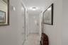 Entry foyer with storage closets