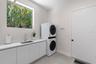 Laundry Room With Abundant Storage Space, Utility Sink And Plenty Of Natural Light
