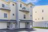 Rare end-unit townhome with water views and direct beach access just steps away.