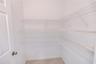Third floor guest suite with spacious closets and a serene ensuite bath.