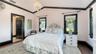 Bright guest bedroom with elegant finishes