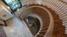 Custom spiral staircase with artisan ironwork
