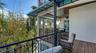Private balcony surrounded by tropical greenery