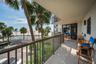 The large wraparound balcony leading to the beach side