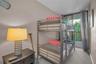 Second bedroom bunkbed with the balcony adjacent
