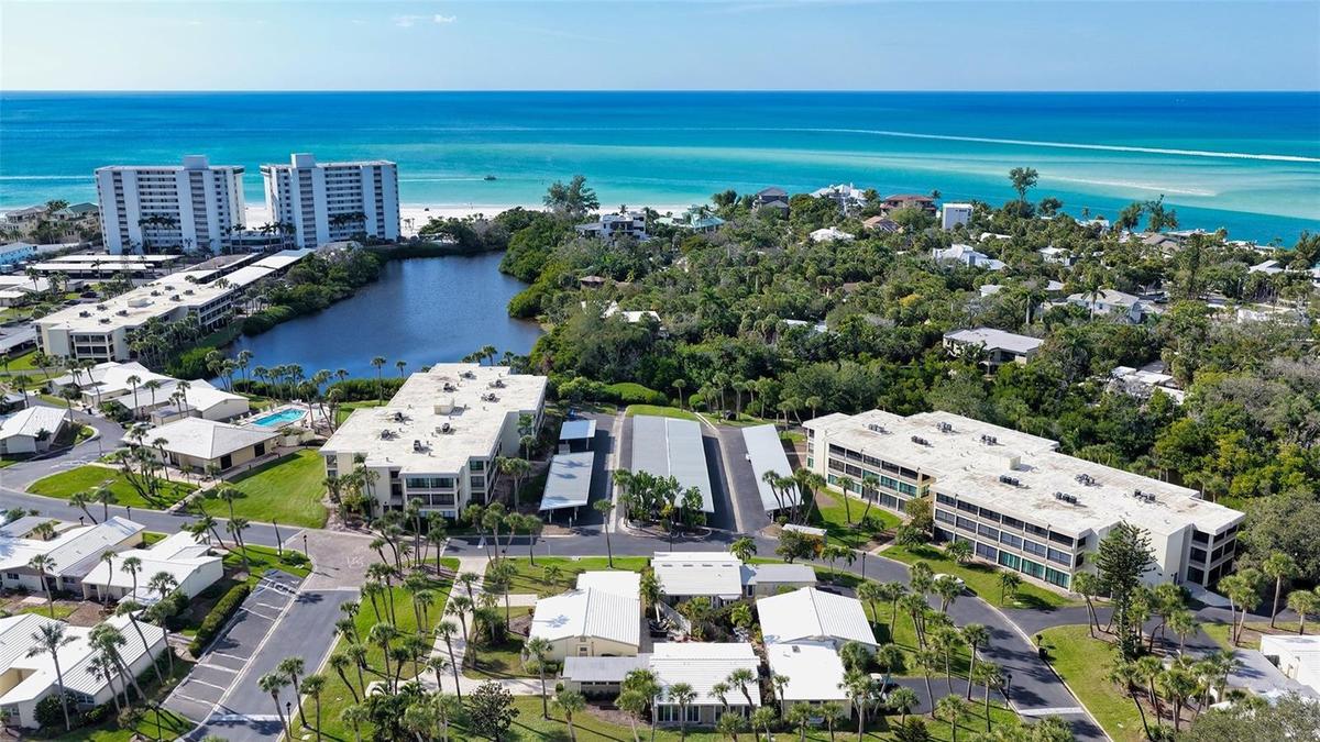 This wonderful villa is nestled in the quad of 4 in this aerial photo in the Gulf front property of Whispering Sands!