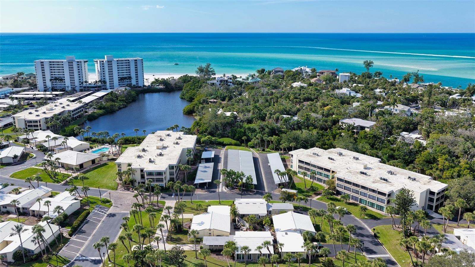This wonderful villa is nestled in the quad of 4 in this aerial photo in the Gulf front property of Whispering Sands!